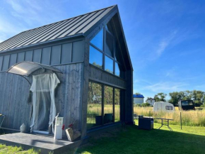 Ferienhaus“ Blaues Wunder“ am Wasser mit Grill, Nowe Warpno